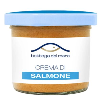 Confezione da 100g di Crema di Salmone Bottega del Mare su un vassoio da aperitivo.